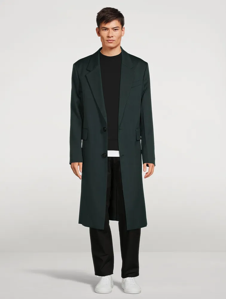 AMI PARIS Wool Oversized Coat can be rewritten as AMI PARIS Wool Coat Oversized for better search engine optimization.