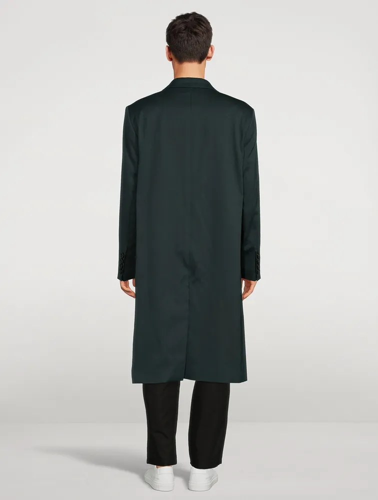 AMI PARIS Wool Oversized Coat can be rewritten as AMI PARIS Wool Coat Oversized for better search engine optimization.