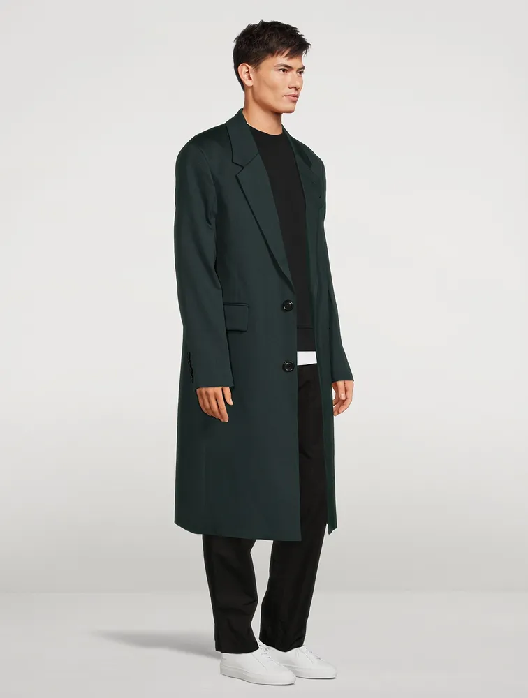 AMI PARIS Wool Oversized Coat can be rewritten as AMI PARIS Wool Coat Oversized for better search engine optimization.