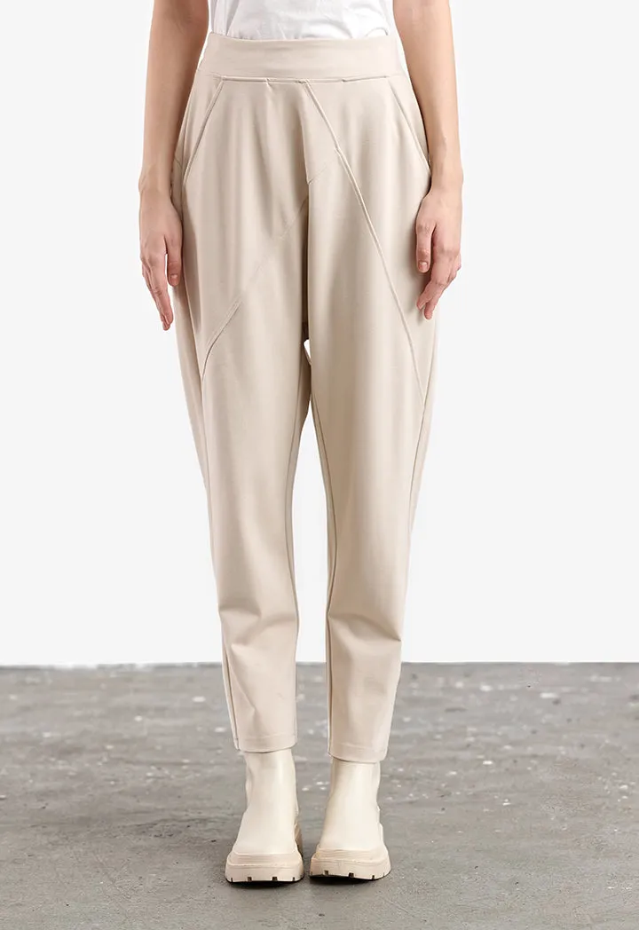 Asymmetrical Baggy Trousers in Solid Pattern