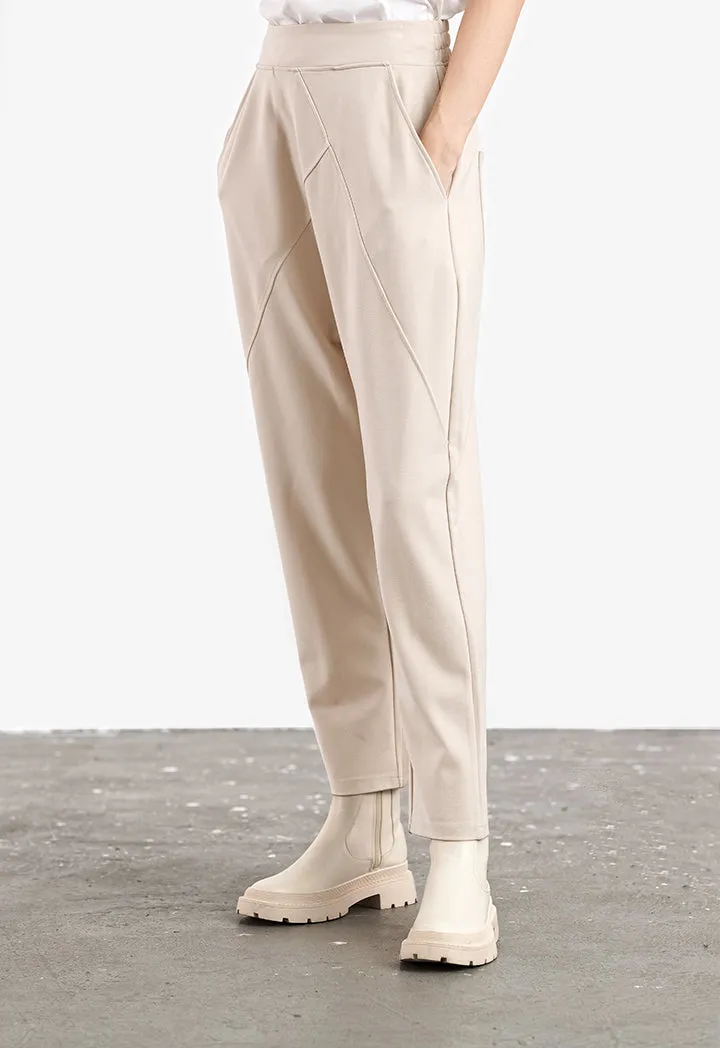 Asymmetrical Baggy Trousers in Solid Pattern