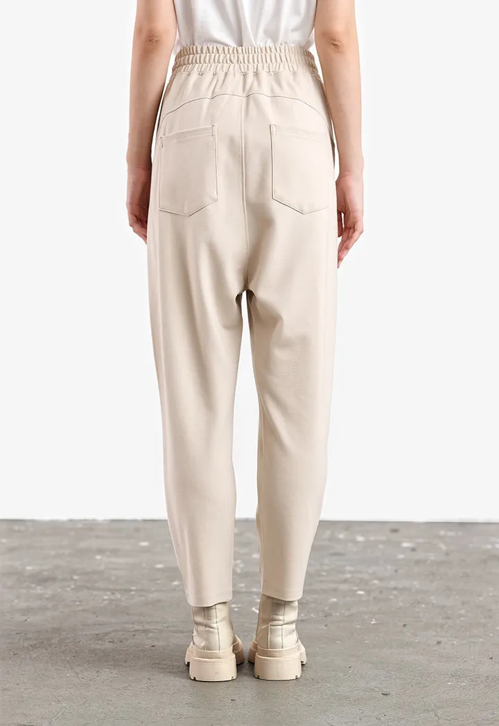 Asymmetrical Baggy Trousers in Solid Pattern