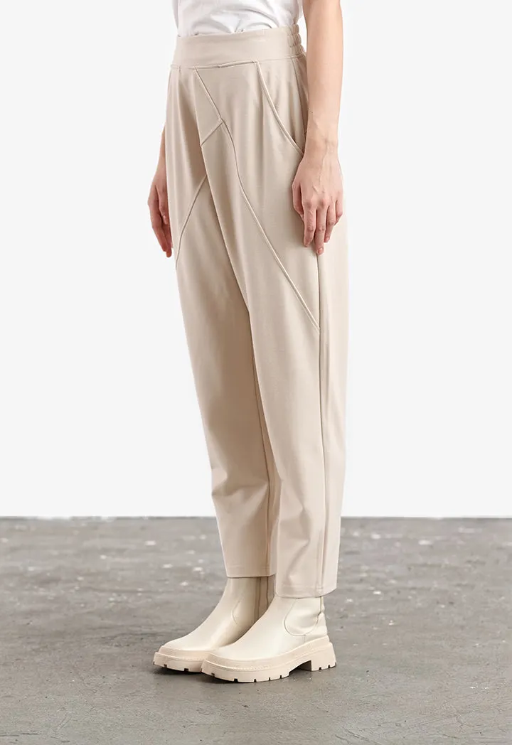 Asymmetrical Baggy Trousers in Solid Pattern