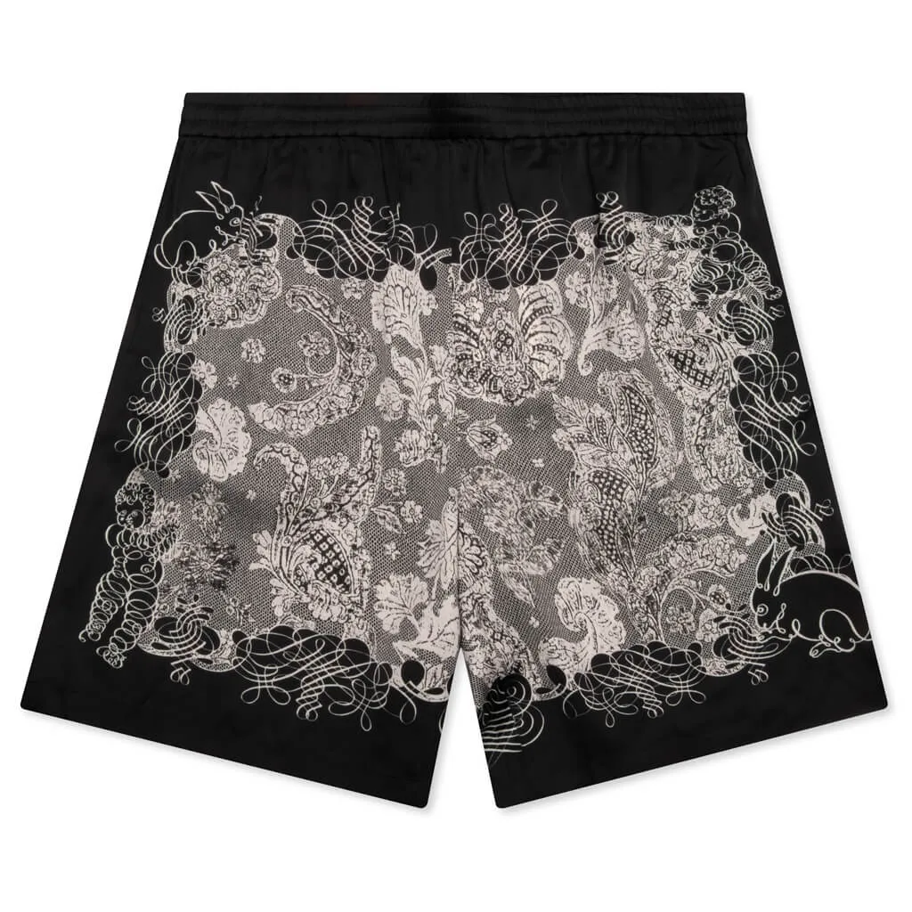 Black and ecru shorts.