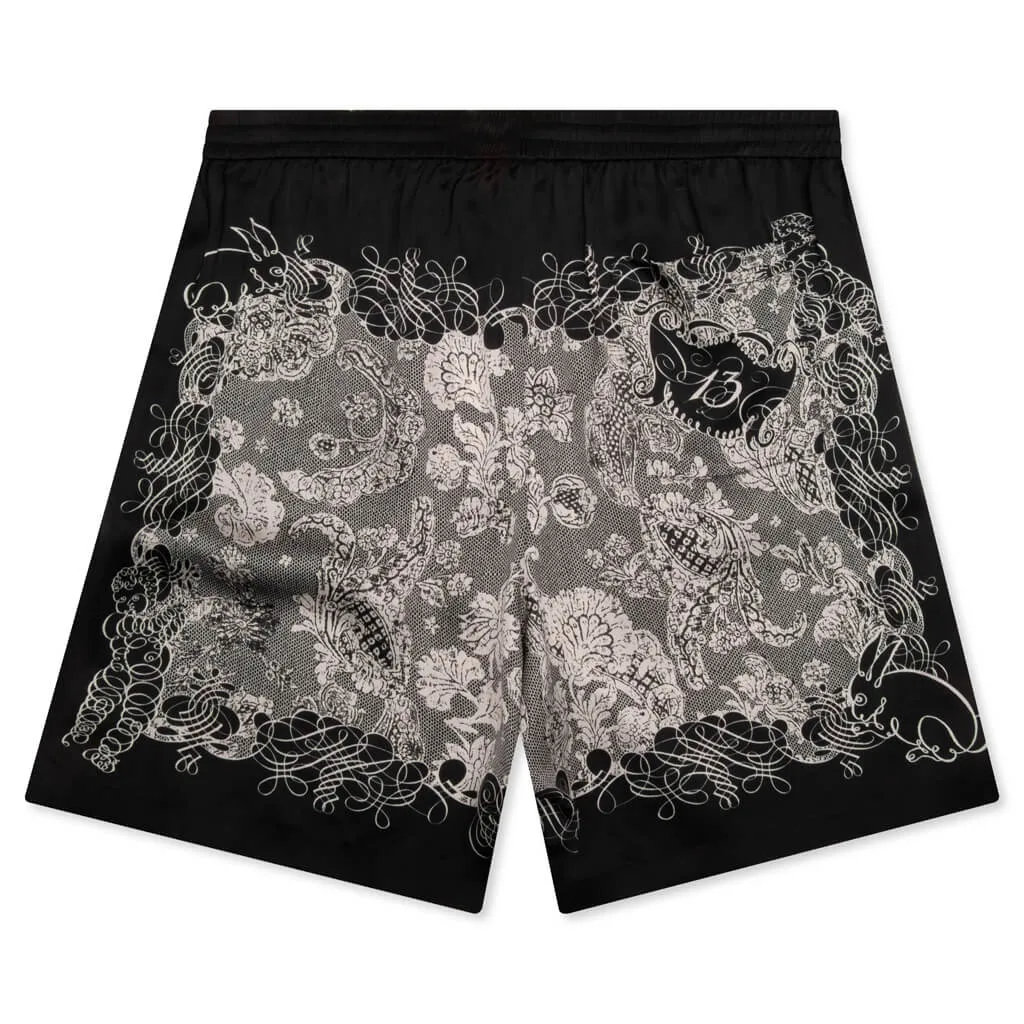 Black and ecru shorts.