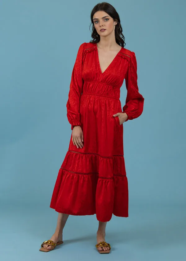 Red silk jacquard dress.